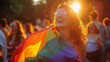 A lively scene of friends at a park during a gay pride picnic draped in a rainbow flag