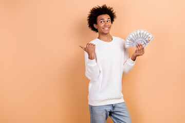 Sticker - Photo of positive satisfied man win lottery jackpot recommend casino club empty space promo isolated on beige color background