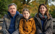 © Susan - Family group in park wearing coats