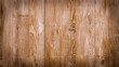 Brown panels, wooden floor background, texture, abstraction close up. Brązowe panele, drewniana podłoga tło, tekstura, abstrakcja z bliska.