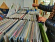 hands choosing vinyl records at the flea market