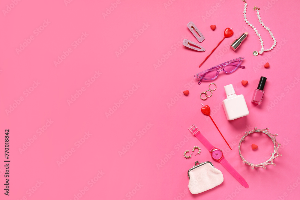 Composition with stylish female accessories, cosmetics and candles on pink background
