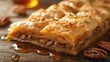 Medium shot of Greek baklava, a sweet pastry made of layers of filo filled with chopped nuts and sweetened with honey