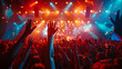 © jr-art - A crowd of people are at a concert, with their hands raised in the air