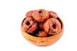 Close up of Kuih Keria Malaysian Sweet Potato Doughnut  in wood plate on white background