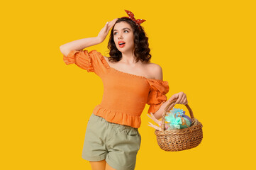 Sticker - Beautiful pin-up woman with Easter basket on yellow background