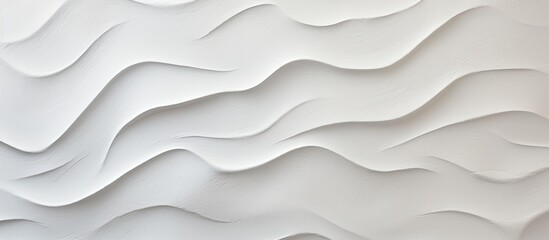 Wall Mural - A close up of a grey slope landscape with aeolian landform patterns resembling waves on a white wall, creating a serene and unique aesthetic