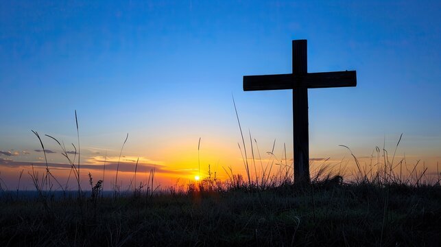 A powerful photograph of a cross silhouetted against a clear blue sky with the morning sun, conveying the significance of the cross in the Christian faith and the promise of redemption