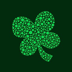 Four leaf clover made of small green circles on darker green background