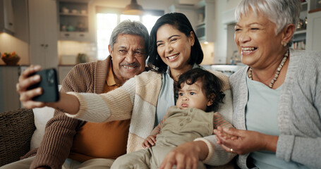 Canvas Print - Selfie, woman and senior parents with baby bonding together on a sofa for relaxing at home. Happy, smile and female person taking a picture with elderly people and child in retirement in the lounge.