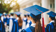 girl in blue and silver graduation cap, blonde and brunette high school gowns, symbolizing academic achievement and diversity
