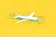 © ADDICTIVE STOCK - Airplane illustration on a vibrant yellow background. Generative AI image