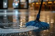 A mop washing a shiny floor with soapy water.