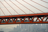 Fototapeta Sawanna - The Dongshuimen Bridge in a foggy day.