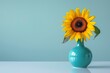 A captivating single sunflower displayed in a blue vase, set against a matching blue backdrop symbolizing clarity and focus