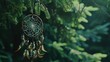 A close up image of a handmade dream catcher with dark green trees in the background,Dream catcher ancient belief and so antic,Dreamcatcher sunset , boho chic, ethnic amulet,symbol, 
