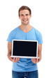 Man, portrait and laptop with screen in studio for social media advertisement, internet announcement and happy. Mockup space, person and technology for website marketing and smile on white background
