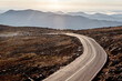 © Cavan Images - A car drives up Mount Washington auto road at dawn, New Hampshire.