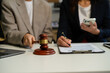 Businessman and Male lawyer or judge consult having team meeting with client, Law and Legal services concept in office.