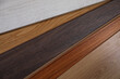 © New Africa - Different samples of wooden flooring as background, closeup