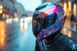 A rider wearing a helmet adorned with vibrant graphics, adding a pop of color to the sport bike's overall aesthetic