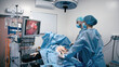 © Vladislav - Surgeons use an endoscope during laparoscopy surgery. Concept of surgery, health and modern medical technologies.