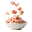 Pieces of raw chicken meat in a bowl. Isolated on a transparent background.
