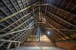 Authentic oak trusses roof in a farm house.