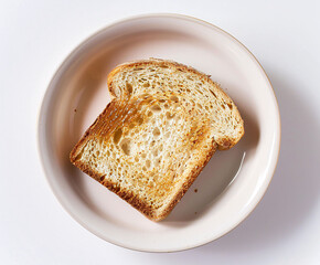 Wall Mural - perfectly toasted bread on a plate on white background