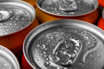 Wall Mural - Energy drinks in wet cans, closeup. Functional beverage