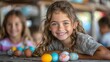 children as they participate in an Easter egg decorating