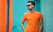 handsome man wearing T-shirts mockup empty in orange t shirt