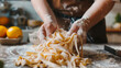 Close up hand making pasta