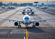 © Graphic Dude - Airplane on the runway of the airport in the morning, travel concept