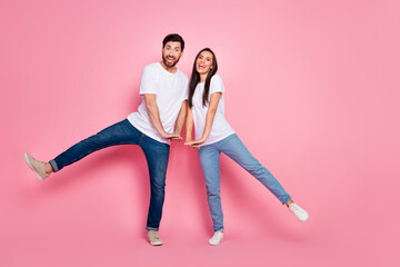 Sticker - Full body photo of nice young couple dance have fun cute pose sing wear trendy white outfit isolated on pink color background