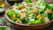 Fresh Green Caesar Salad with Croutons in Wooden Bowl