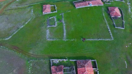 Wall Mural - Eras and town in Aldehuela de Calatañazor from a drone view. Tierras del Burgo region. Province of Soria. Castile and Leon. Spain. Europe