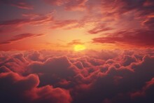 A Close Up Of A Vibrant And Colorful Sunset Sky, With The Sun Barely Visible In The Horizon And The Sky Filled With Deep Oranges And Pinks