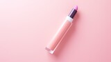 Fototapeta  - A pink lipstick is on a pink background
