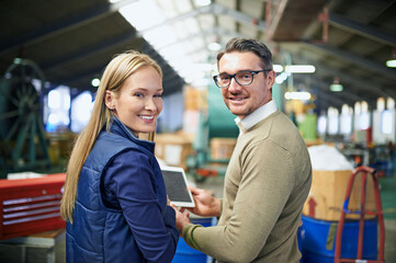 Poster - Man, woman and portrait in warehouse with tablet for inspection or stock for supply chain, distribution or manufacturing. Factory workers, face and teamwork or courier logistics, import or delivery