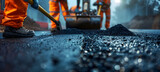Fototapeta  - A close-up view of a road construction crew at work, showing details of workers, machinery, and the fresh asphalt being laid down