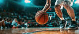 Fototapeta Natura - Basketball player is holding basketball ball on a court, close up photo	
