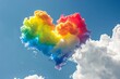 Rainbow colored heart shaped cloud in sky, LGBT love and pride concept