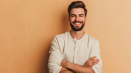 Wall Mural - portrait of a brown hair man with big smile and beige background