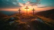   Three crosses atop a hill against a sunset backdrop with scattering clouds in the sky