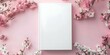 White Hardcover Book Mockup with Pink Flower Background Design and Text Space. Concept Book Mockup, White Hardcover, Pink Flower Background, Text Space