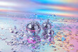 © Yaroslav Danylchenko/Stocksy - Decorative disco balls with silver confetti on iridescent background