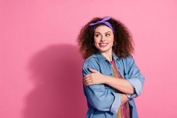 Photo of dreamy sweet lady dressed jeans outfit hugging herself looking herself isolated pink color background