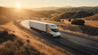 Semi-autonomous truck driving on an open road amidst hilly terrain during a golden sunset