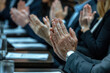 Contemporary business people hands clapping at conference